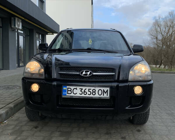 Черный Хендай Туксон, объемом двигателя 1.99 л и пробегом 290 тыс. км за 7700 $, фото 14 на Automoto.ua