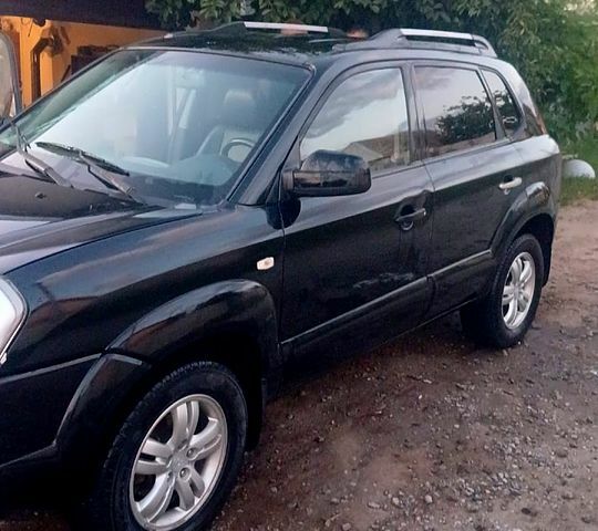 Чорний Хендай Туксон, об'ємом двигуна 2 л та пробігом 230 тис. км за 7000 $, фото 1 на Automoto.ua