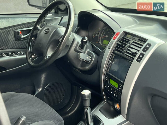 Хендай Туксон 2006 у Тернополі на Automoto.ua Чорний Хендай Туксон, об'ємом двигуна 2 л та пробігом 240 тис. км за 6699 $, фото 41 на Automoto.ua