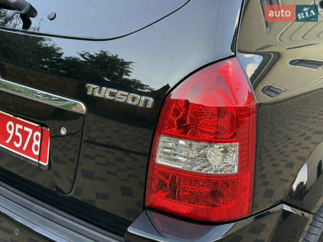 Чорний Хендай Туксон, об'ємом двигуна 1.98 л та пробігом 212 тис. км за 8200 $, фото 39 на Automoto.ua