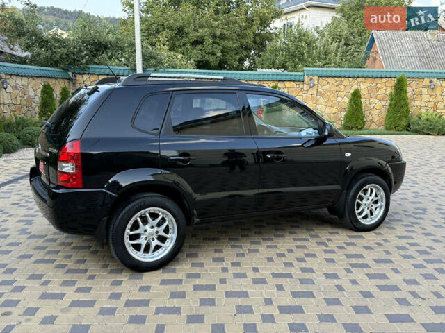 Чорний Хендай Туксон, об'ємом двигуна 1.98 л та пробігом 212 тис. км за 8200 $, фото 11 на Automoto.ua