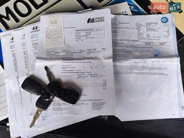 Черный Хендай Туксон, объемом двигателя 2 л и пробегом 237 тыс. км за 7999 $, фото 27 на Automoto.ua