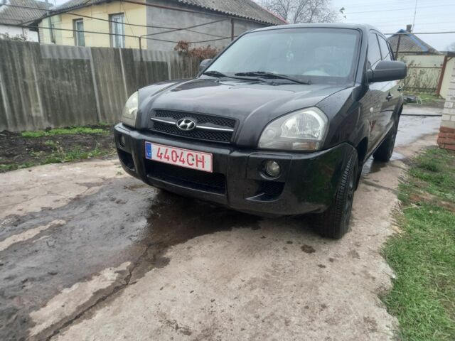 Черный Хендай Туксон, объемом двигателя 2 л и пробегом 395 тыс. км за 4500 $, фото 11 на Automoto.ua