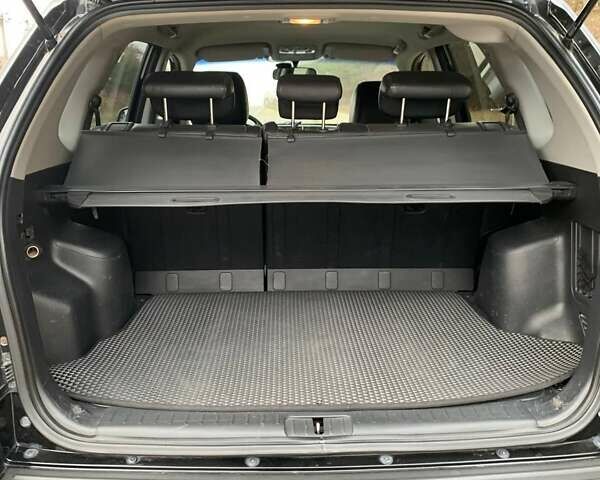 Черный Хендай Туксон, объемом двигателя 1.98 л и пробегом 196 тыс. км за 7700 $, фото 8 на Automoto.ua