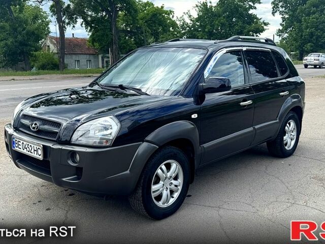 Черный Хендай Туксон, объемом двигателя 2 л и пробегом 192 тыс. км за 7700 $, фото 2 на Automoto.ua