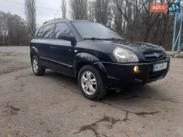 Чорний Хендай Туксон, об'ємом двигуна 1.99 л та пробігом 298 тис. км за 7750 $, фото 1 на Automoto.ua