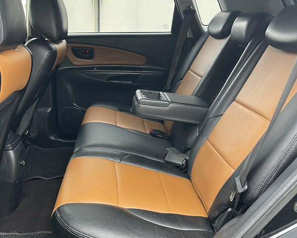 Черный Хендай Туксон, объемом двигателя 2 л и пробегом 216 тыс. км за 7500 $, фото 21 на Automoto.ua