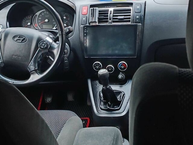 Черный Хендай Туксон, объемом двигателя 2 л и пробегом 124 тыс. км за 7200 $, фото 12 на Automoto.ua