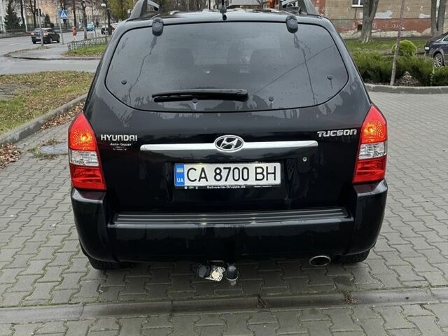 Черный Хендай Туксон, объемом двигателя 2 л и пробегом 242 тыс. км за 6999 $, фото 3 на Automoto.ua