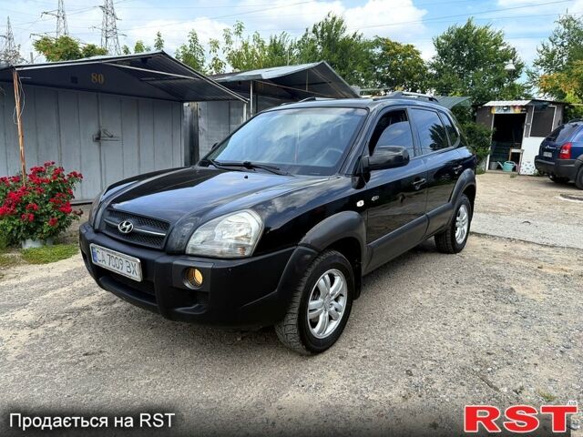 Чорний Хендай Туксон, об'ємом двигуна 2 л та пробігом 254 тис. км за 7650 $, фото 2 на Automoto.ua