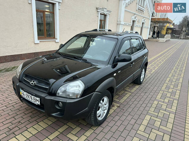 Черный Хендай Туксон, объемом двигателя 1.98 л и пробегом 227 тыс. км за 6900 $, фото 6 на Automoto.ua