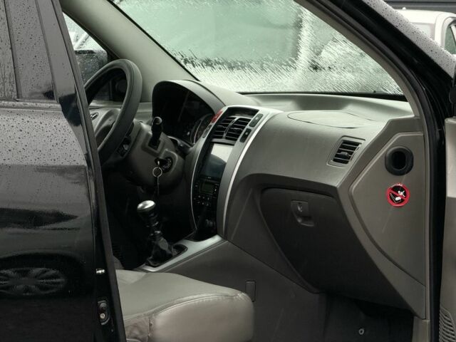 Черный Хендай Туксон, объемом двигателя 2 л и пробегом 263 тыс. км за 7950 $, фото 13 на Automoto.ua