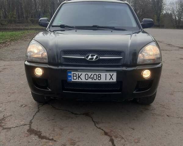 Чорний Хендай Туксон, об'ємом двигуна 1.99 л та пробігом 298 тис. км за 7750 $, фото 7 на Automoto.ua