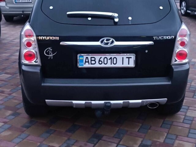 Черный Хендай Туксон, объемом двигателя 2 л и пробегом 124 тыс. км за 7200 $, фото 1 на Automoto.ua