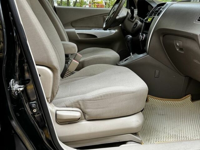 Черный Хендай Туксон, объемом двигателя 2 л и пробегом 240 тыс. км за 5600 $, фото 8 на Automoto.ua