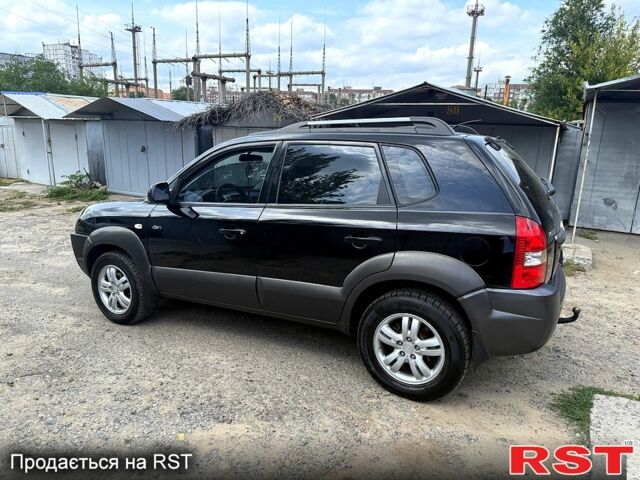 Чорний Хендай Туксон, об'ємом двигуна 2 л та пробігом 254 тис. км за 7650 $, фото 1 на Automoto.ua