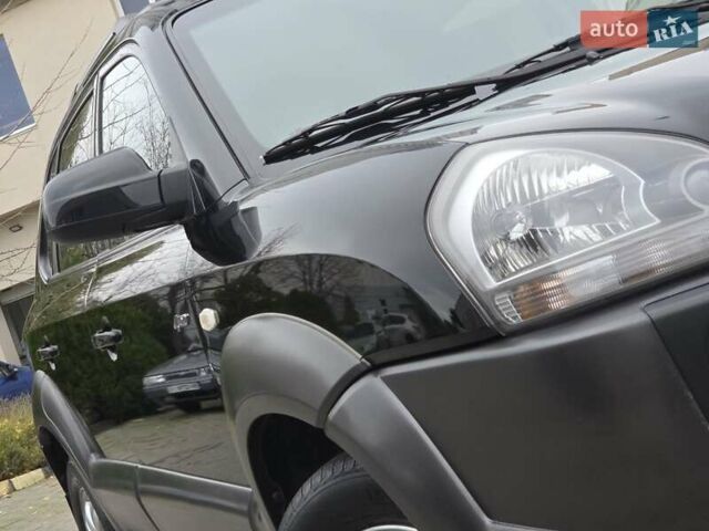 Чорний Хендай Туксон, об'ємом двигуна 1.98 л та пробігом 123 тис. км за 7950 $, фото 12 на Automoto.ua