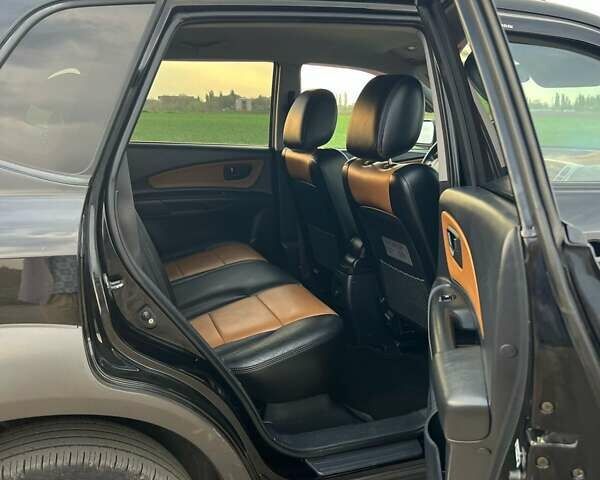 Черный Хендай Туксон, объемом двигателя 2 л и пробегом 168 тыс. км за 8000 $, фото 15 на Automoto.ua