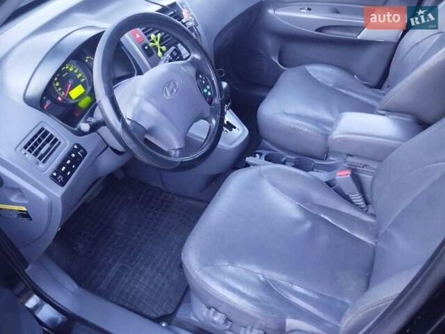 Чорний Хендай Туксон, об'ємом двигуна 1.99 л та пробігом 239 тис. км за 6990 $, фото 23 на Automoto.ua