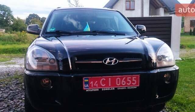 Черный Хендай Туксон, объемом двигателя 2 л и пробегом 205 тыс. км за 7200 $, фото 24 на Automoto.ua