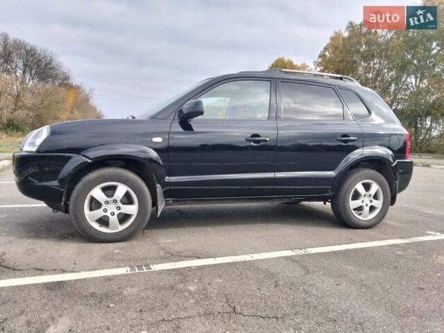 Черный Хендай Туксон, объемом двигателя 2 л и пробегом 127 тыс. км за 7590 $, фото 5 на Automoto.ua
