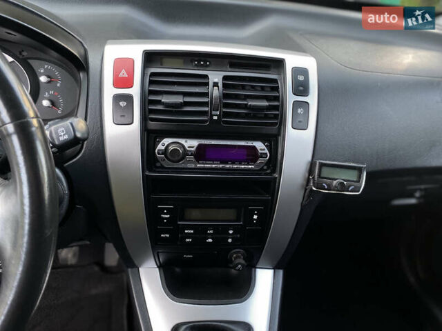 Чорний Хендай Туксон, об'ємом двигуна 1.98 л та пробігом 233 тис. км за 7650 $, фото 51 на Automoto.ua