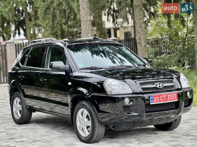 Черный Хендай Туксон, объемом двигателя 2 л и пробегом 187 тыс. км за 7550 $, фото 5 на Automoto.ua