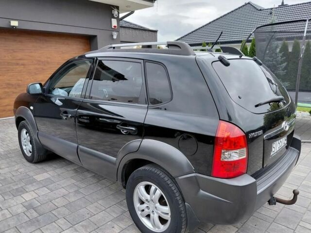 Черный Хендай Туксон, объемом двигателя 2 л и пробегом 298 тыс. км за 2200 $, фото 4 на Automoto.ua