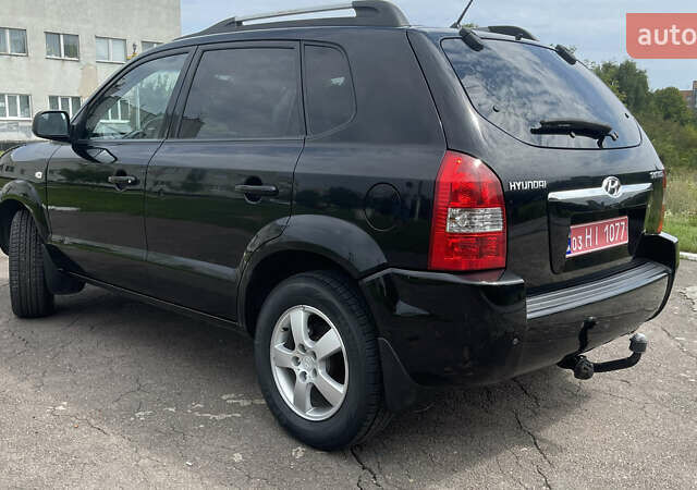 Черный Хендай Туксон, объемом двигателя 2 л и пробегом 236 тыс. км за 6950 $, фото 3 на Automoto.ua