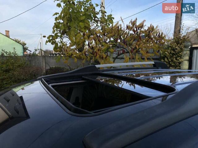 Чорний Хендай Туксон, об'ємом двигуна 1.98 л та пробігом 233 тис. км за 7650 $, фото 76 на Automoto.ua