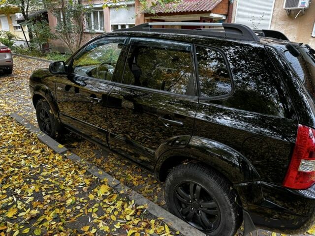 Черный Хендай Туксон, объемом двигателя 2 л и пробегом 240 тыс. км за 5600 $, фото 3 на Automoto.ua