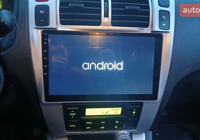 Черный Хендай Туксон, объемом двигателя 1.98 л и пробегом 320 тыс. км за 6300 $, фото 34 на Automoto.ua