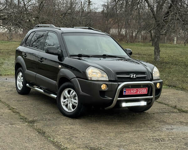 Черный Хендай Туксон, объемом двигателя 2 л и пробегом 201 тыс. км за 7750 $, фото 2 на Automoto.ua