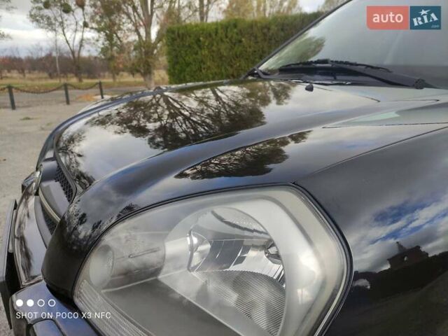 Черный Хендай Туксон, объемом двигателя 2 л и пробегом 237 тыс. км за 7999 $, фото 39 на Automoto.ua