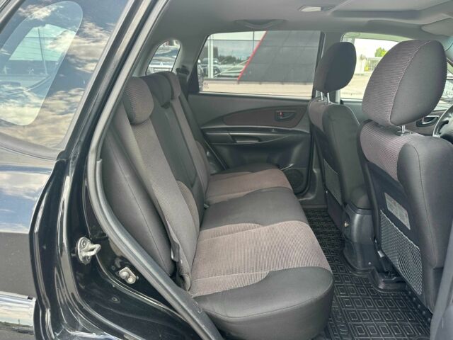 Чорний Хендай Туксон, об'ємом двигуна 2 л та пробігом 306 тис. км за 6900 $, фото 13 на Automoto.ua