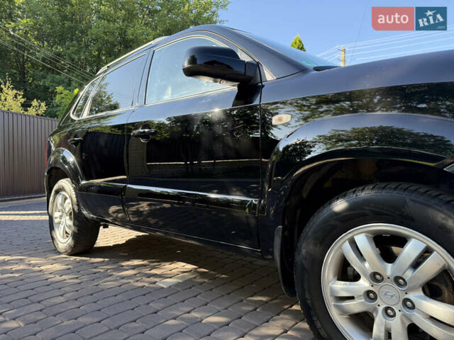 Черный Хендай Туксон, объемом двигателя 2 л и пробегом 192 тыс. км за 6950 $, фото 10 на Automoto.ua