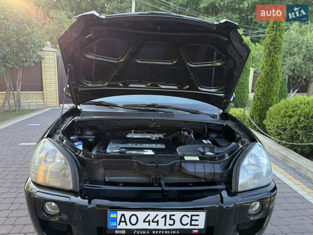 Черный Хендай Туксон, объемом двигателя 2 л и пробегом 192 тыс. км за 6950 $, фото 40 на Automoto.ua