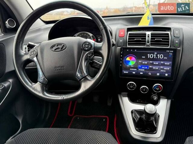 Чорний Хендай Туксон, об'ємом двигуна 2 л та пробігом 124 тис. км за 7950 $, фото 16 на Automoto.ua