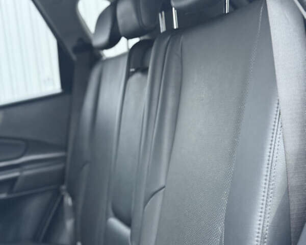 Черный Хендай Туксон, объемом двигателя 1.98 л и пробегом 231 тыс. км за 7750 $, фото 32 на Automoto.ua