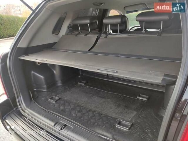 Черный Хендай Туксон, объемом двигателя 2 л и пробегом 237 тыс. км за 7999 $, фото 5 на Automoto.ua