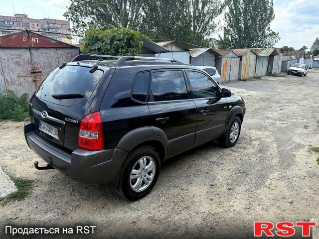 Чорний Хендай Туксон, об'ємом двигуна 2 л та пробігом 254 тис. км за 7650 $, фото 5 на Automoto.ua