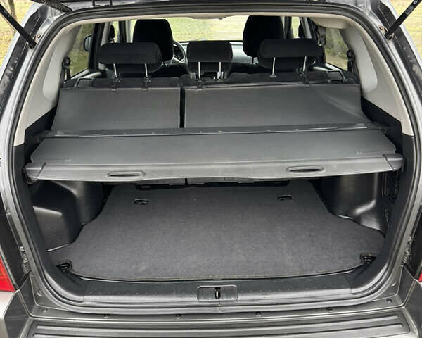 Черный Хендай Туксон, объемом двигателя 2 л и пробегом 201 тыс. км за 7750 $, фото 55 на Automoto.ua