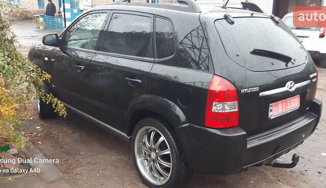 Чорний Хендай Туксон, об'ємом двигуна 1.99 л та пробігом 243 тис. км за 8850 $, фото 14 на Automoto.ua