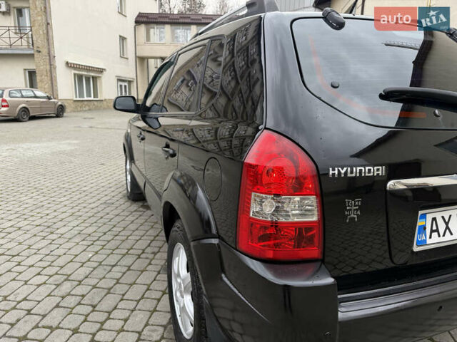 Черный Хендай Туксон, объемом двигателя 1.98 л и пробегом 250 тыс. км за 7150 $, фото 9 на Automoto.ua