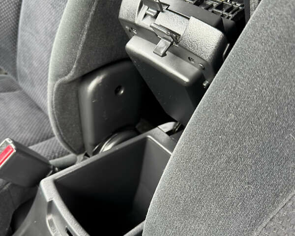 Черный Хендай Туксон, объемом двигателя 2 л и пробегом 201 тыс. км за 7750 $, фото 43 на Automoto.ua