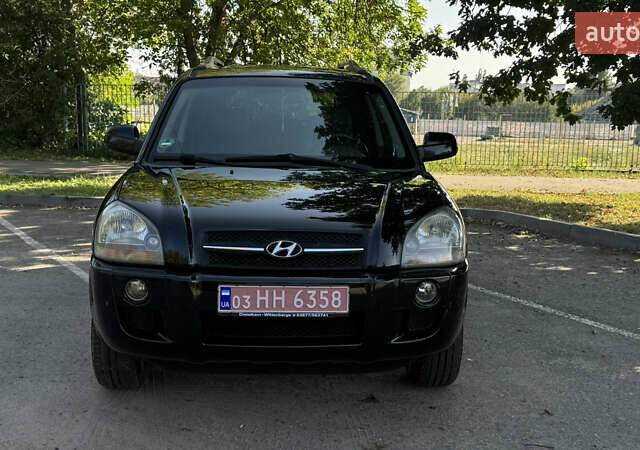 Черный Хендай Туксон, объемом двигателя 2 л и пробегом 266 тыс. км за 7000 $, фото 1 на Automoto.ua