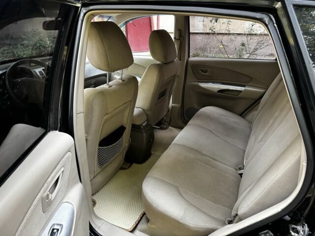 Черный Хендай Туксон, объемом двигателя 2 л и пробегом 240 тыс. км за 5600 $, фото 4 на Automoto.ua