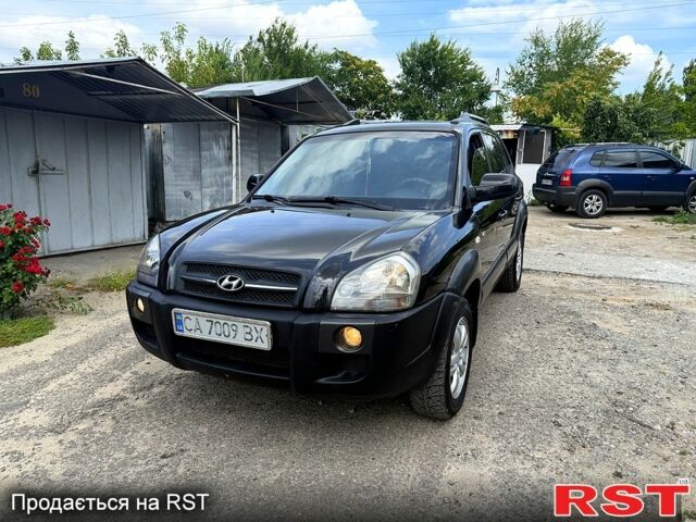Чорний Хендай Туксон, об'ємом двигуна 2 л та пробігом 254 тис. км за 7650 $, фото 3 на Automoto.ua