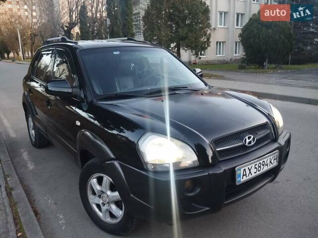 Чорний Хендай Туксон, об'ємом двигуна 1.99 л та пробігом 239 тис. км за 6990 $, фото 6 на Automoto.ua