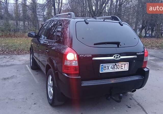 Черный Хендай Туксон, объемом двигателя 1.98 л и пробегом 320 тыс. км за 6300 $, фото 10 на Automoto.ua